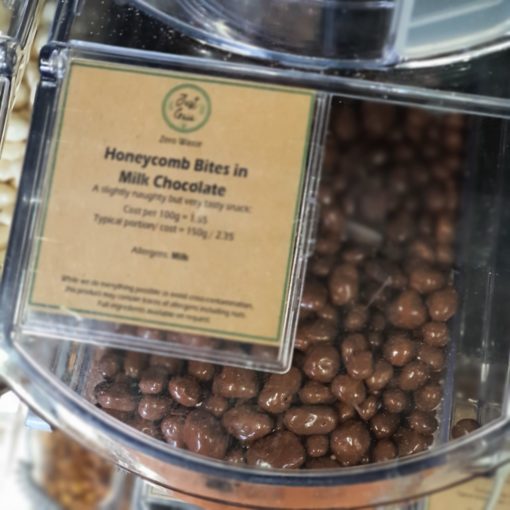 Chocolate honeycomb bites pieces in the plastic free snacks and treats section Just Gaia zero waste grocery in Halifax, West Yorkshire