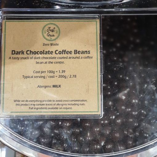 Dark chocolate coffee beans display in the plastic free snacks and treats section Just Gaia zero waste grocery in Halifax, West Yorkshire