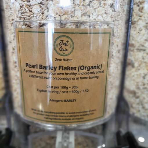 Organic pearl barley flakes dispenser in the plastic free snacks and treats section Just Gaia zero waste grocery in Halifax, West Yorkshire