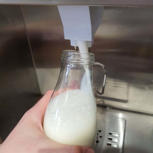 Organic Semi-skimmed milk dispenser in the plastic free snacks and treats section Just Gaia zero waste grocery in Halifax, West Yorkshire