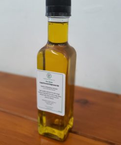 Our Just Gaia cold pressed oils. Zero waste rapeseed oil infused with rosemary and garlic in a glass bottle.